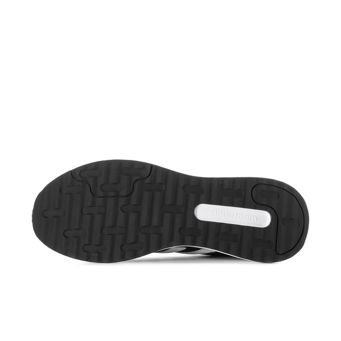 Men's black rubber outsole with raised tread and white midsole trim on adidas sneakers