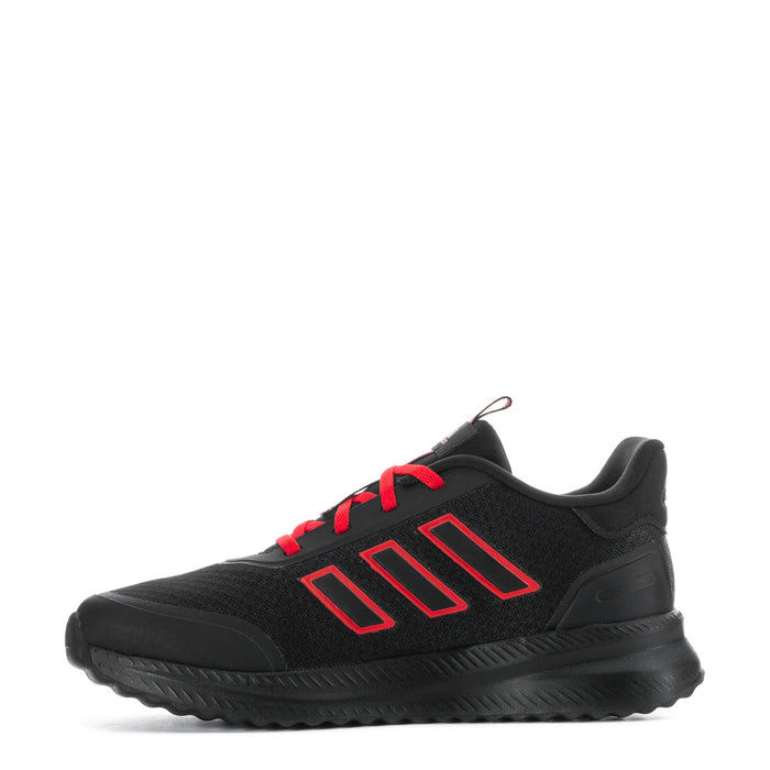 Youth black athletic shoe with ruby red lace accents and bold side stripe detail