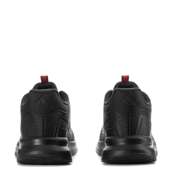 Youth black sneakers rear view with ruby red heel tab and cushioned sole