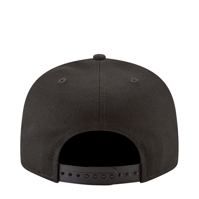 Black baseball cap back view with ventilation eyelets and adjustable strap