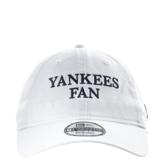 White baseball cap with Yankees Fan front logo and New Era patch