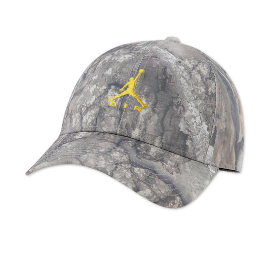 Youth camo snapback hat with yellow Jordan Jumpman logo, curved brim