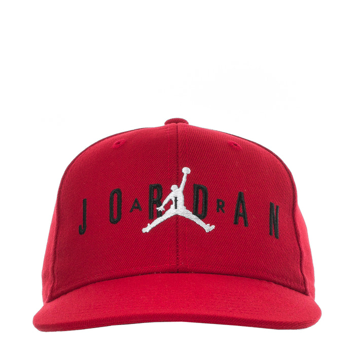 Youth red snapback cap with embroidered JORDAN lettering and Jumpman logo