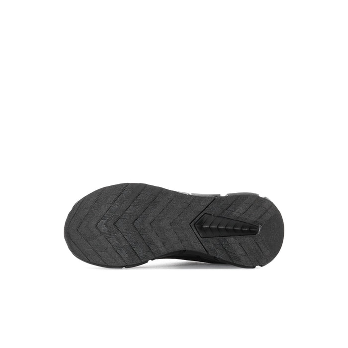 Black kids sneaker outsole with zigzag tread pattern and rubber traction